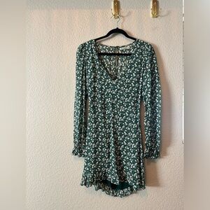 Reformation dress. Green floral v neck dress with long sleeves.